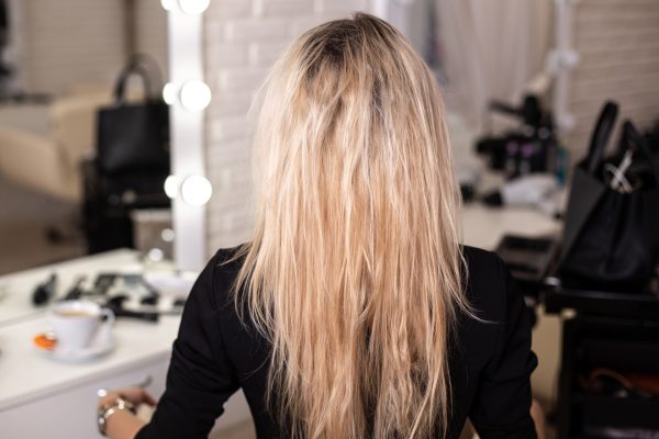 female-back-with-blonde-damaged-hair female-back-with-blonde-damaged-hair